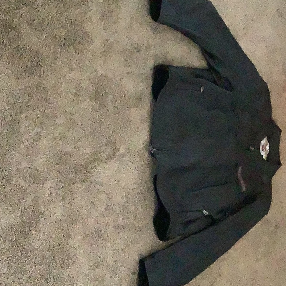 Men’s black Harley Davidson leather jacket.